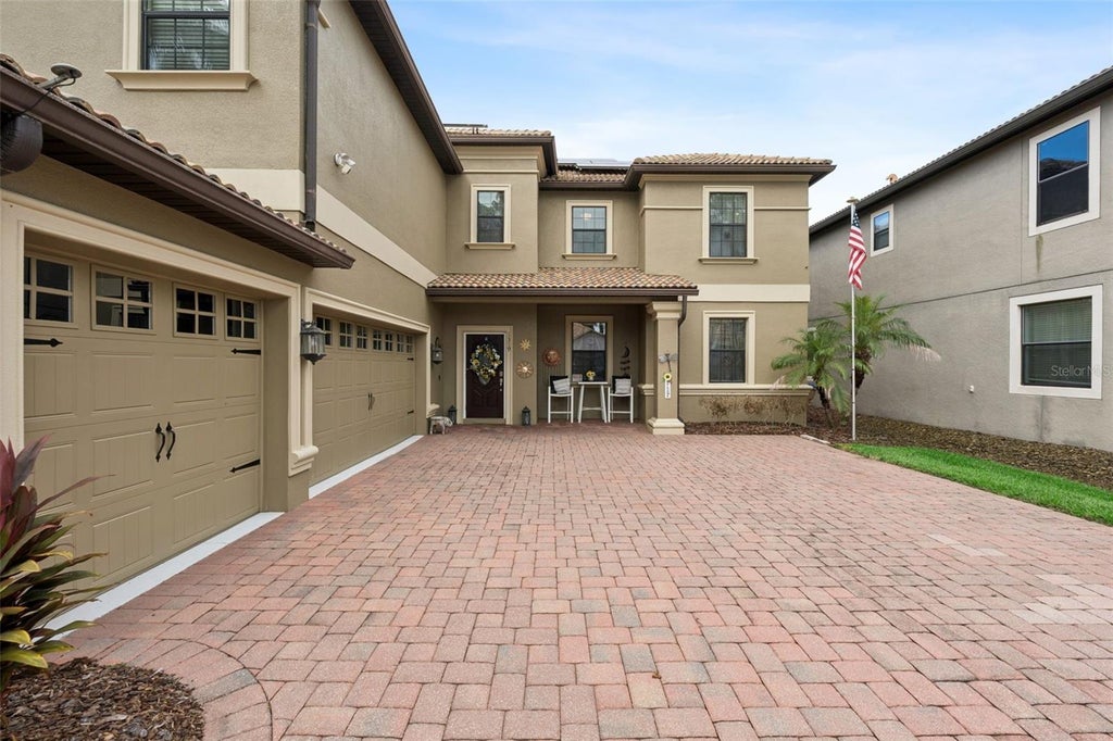 Photo of 1319 Gleneagles Lane, Davenport, FL 33896 (MLS # O6439171)