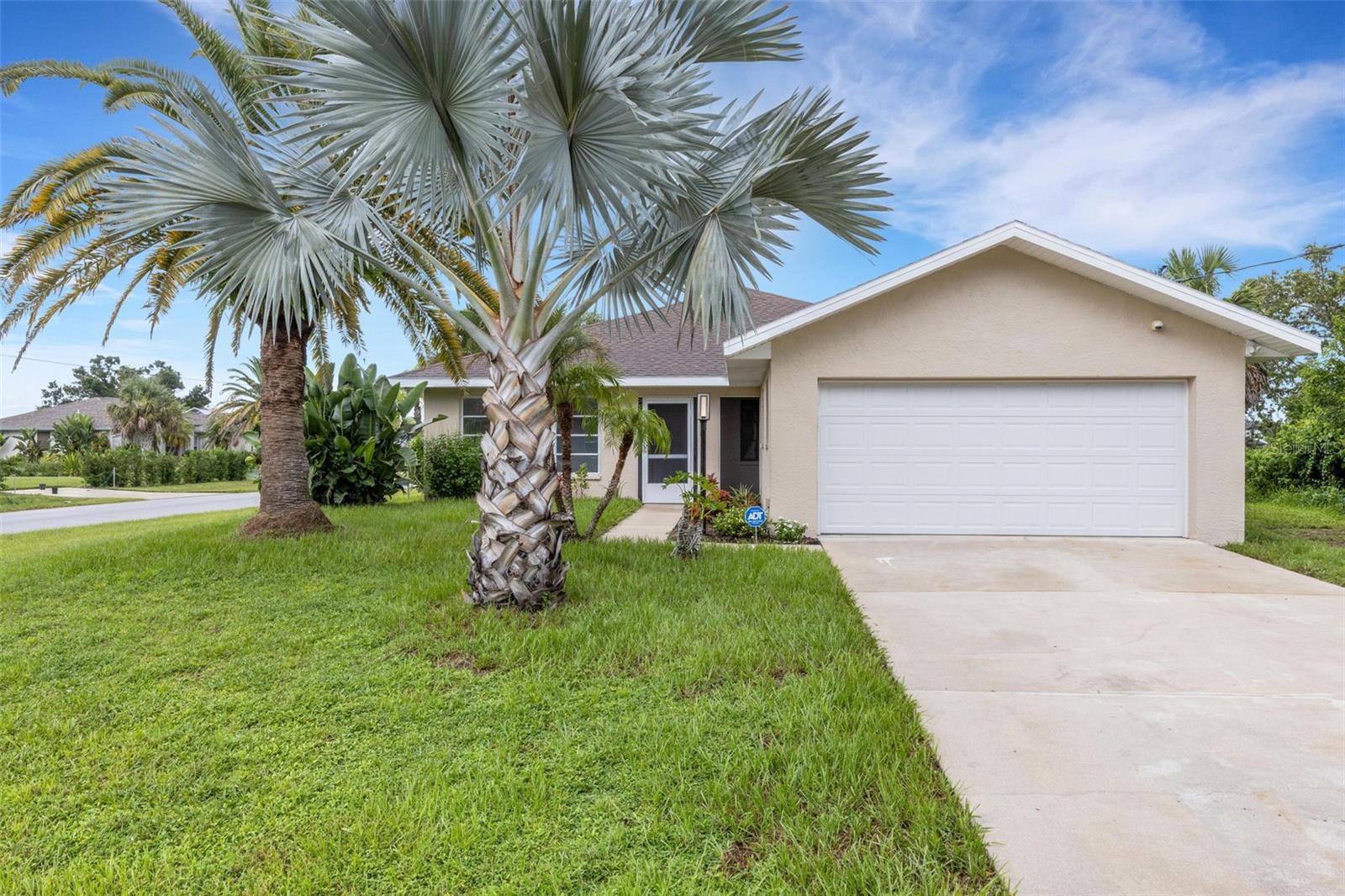 This beautifully updated home offers the perfect blend of comfort and style. Featuring 3 spacious bedrooms and 2 full bathrooms, it sits proudly on a a desirable corner lot with plenty of curb appeal. Step inside and fine an upgraded kitchen with modern finishes and new flooring throughout, creating a fresh and inviting atmosphere. Enjoy the Florida lifestyle in your own backyard oasis with a private pool, perfect for relaxing or entertaining family and friends. With its thoughtful upgrades and prime location this home is move-in ready and waiting for its next owner. Conveniently located near shopping, dining and area beaches, this gem combines comfort, style and location all in one. Don't miss out!