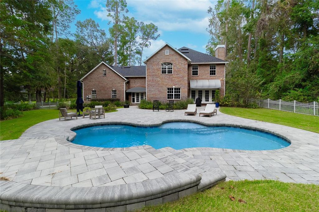 Photo of 11121 NW 15th Place, Gainesville, FL 32606 (MLS # GC534658)