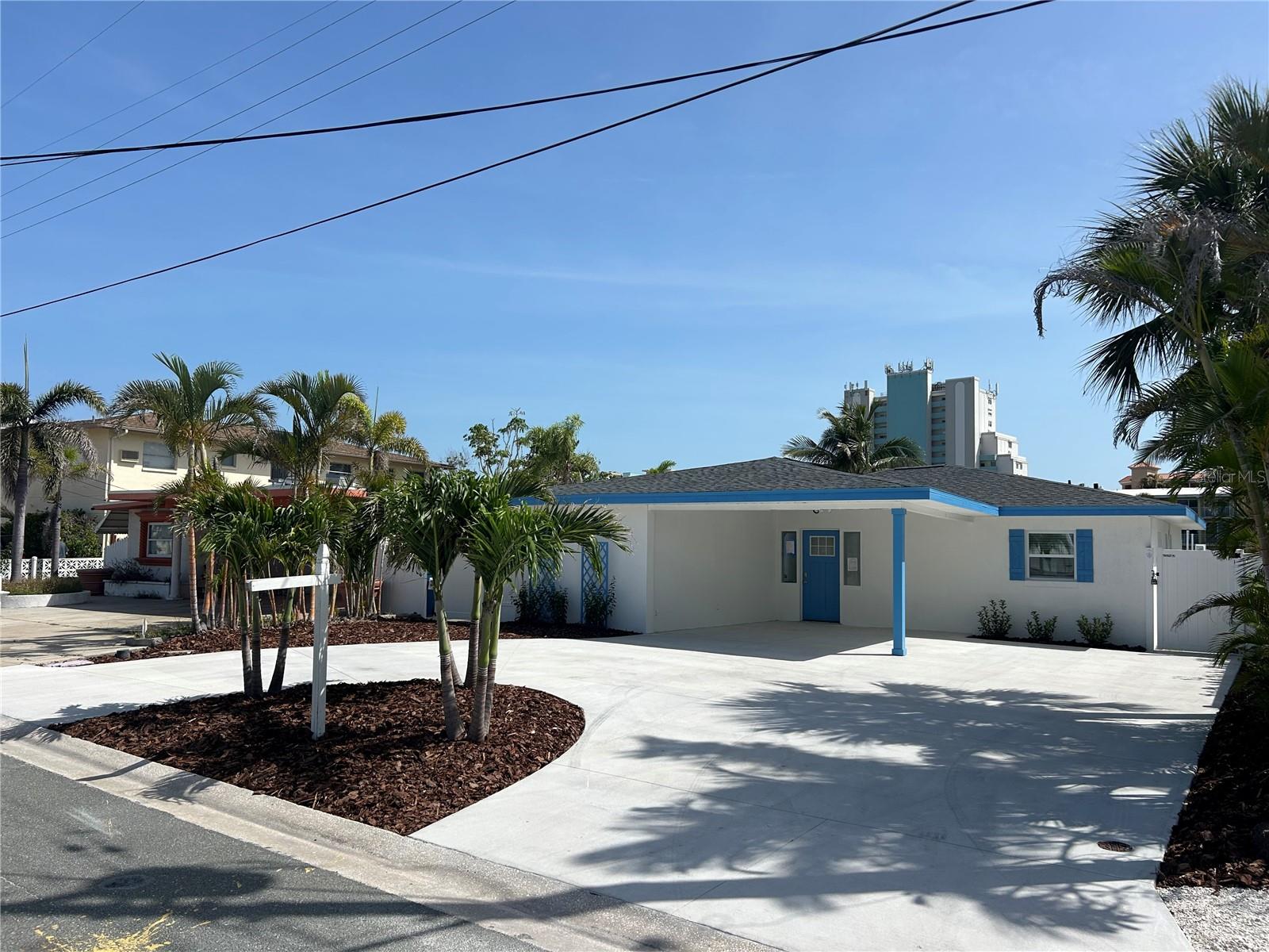 Discover the charm of coastal living in this waterfront property located in one of the most desirable Gulf towns. Nestled right on the water, this home offers stunning views, 15 minutes by boat to John's Pass and the Gulf of Mexico. Only a ONE block walk to the award winning Treasure Island beach. This ideal location with access to the Bay, perfect for water sports, fishing or taking in the view. This home has been beautifully redone top to bottom. New 2025- Entire interior (cabinets, flooring, countertops, drywall, doors) Roof, AC, water heater, appliances, driveway, pool pump, paint (interior and exterior). Boaters/ water lovers dream 10,000 lbs boat lift and a platform lift to lower yourself into the water. This home will not last long, schedule a showing today.
