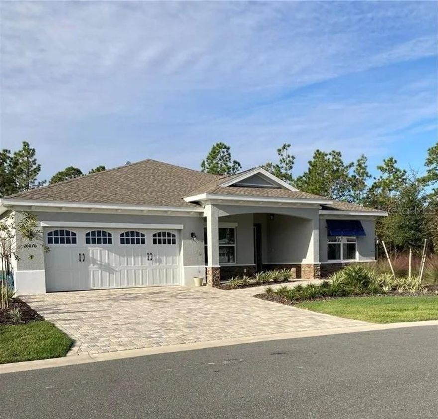 Unfurnished home for rent in On Top of the World! This beautifully customized Ariana model in Longleaf Ridge features 3 bedrooms, 2 bathrooms, and an extended 2-car garage. Enter through the covered front porch with a pavered driveway. Down the hall to the left is the owner’s suite, which includes convenient access to the laundry room through the primary walk-in closet. The ensuite bathroom offers a spacious, walk-in shower. The upgraded kitchen features staggered cabinets, stainless steel appliances, and stone countertops overlooking the living room and dining area in this open-concept floor plan. At the rear of the home, enjoy an all-seasons sunroom with slider windows, a built-in bar with a wine fridge, and custom shades. Step outside to a fully paved back patio on a desirable privacy lot. Located in Longleaf Ridge 5, this rental includes access to all community amenities, including grounds care. Pet Friendly, $3,000 per month plus utilities. Minimum 1-year lease. Property ID: 063LR5