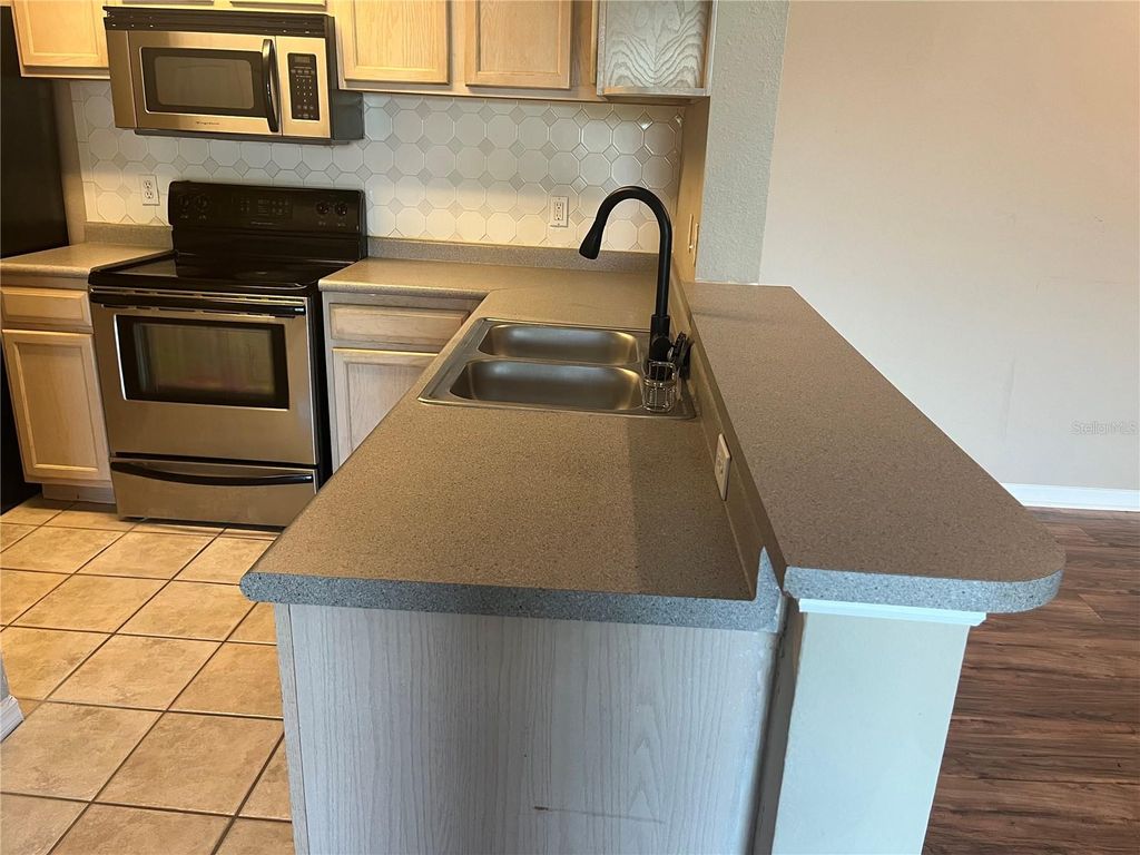 Photo of 7511 Seurat Street #10304, Orlando, FL 32819 (MLS # O6422837)