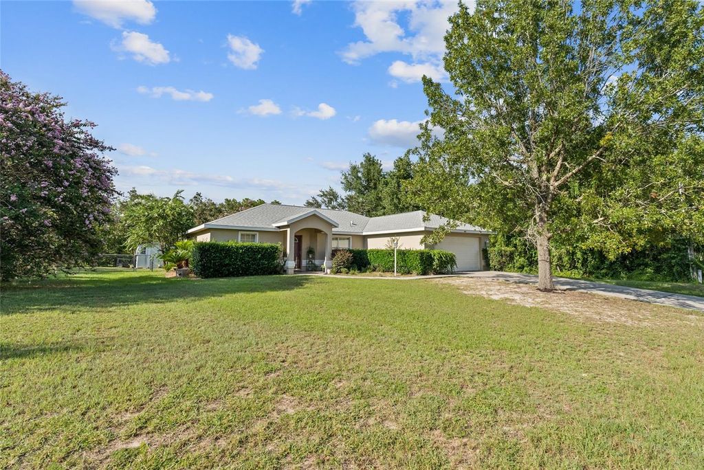 Photo of 5065 SW 128th Street, Ocala, FL 34473 (MLS # OM714844)