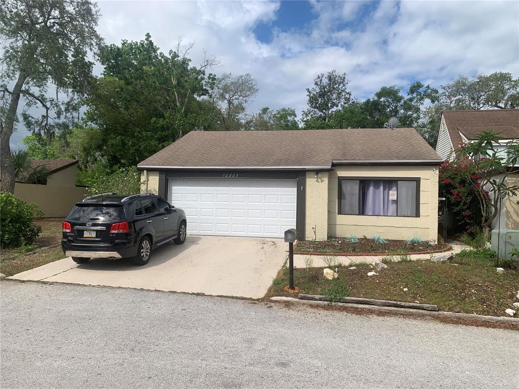 Photo of 12225 Saddle Strap Row, Hudson, FL 34667 (MLS # TB8414722)