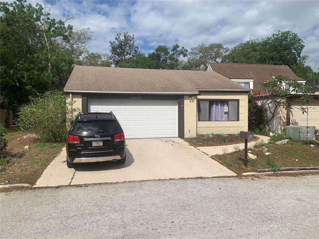 Photo of 12225 Saddle Strap Row, Hudson, FL 34667 (MLS # TB8414722)