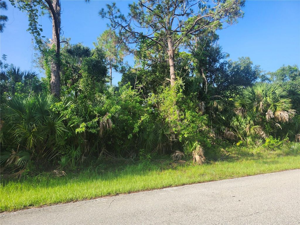 Photo of 18185 Poston Ave, Port Charlotte, FL 33948 (MLS # OM706736)