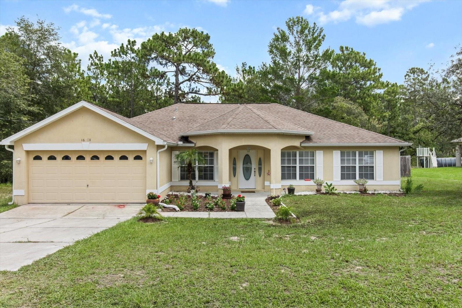 Royal Highlands no deed restrictions, no HOA, not in a flood zone, plenty of room for all your toys! Boats,Rv’s and 4 wheelers Huge 1/2 acre fenced in lot! Large 3 bedroom home with 2 baths with vaulted ceilings on a dead end street! Better than new, ceiling fans,gutters,enclosed shower, backsplash, large concrete patio,fenced in back yard on a dead end street.
