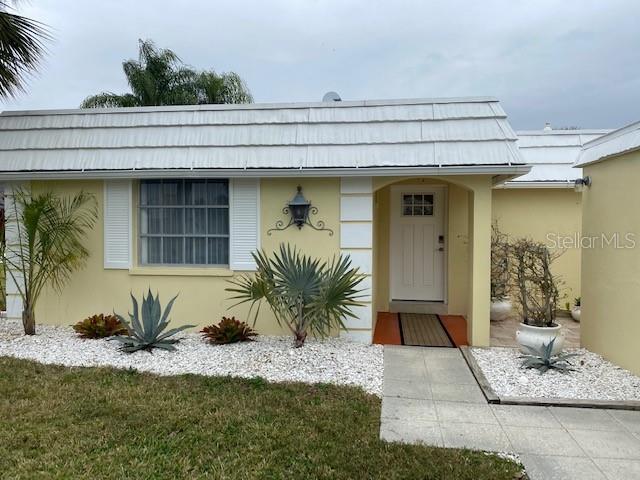 UNFURNISHED ANNUAL RENTAL ...Ready to show July 28. West of trail in Baywood Colony across street from the Intercoastal. Stroll along the lovely walkway in parklike setting. Located minutes from Siesta Beach and Philippi Estate park with its kayak launch, Farmers' Market, and outdoor events! This 2 bed/2ba villa has been updated throughout, featuring a beautiful kitchen with European cabinets and SS appliances, split bedroom plan, new ceiling fans, washer dryer and storage room right outside front door. Villa includes enclosed lanai with green view, carport for 1 car and an unfenced backyard. Application fee of $100 is required by Association for a background check. Call Realtor about the pet policy. Water, sewer, trash, landscaping included. Tenant pays electric and internet. Ready for you to move in!!