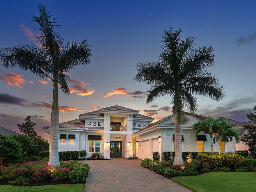 BUYER FINANCING FELL THROUGH - DON'T MISS THIS OPPORTUNITY! Prestigious living in The Lake Club of Lakewood Ranch in within reach! Nestled among towering palms and verdant landscaping is this completely, custom Madison II home built by Stock Luxury Homes in 2021. The lush Florida conservation wetland provides a beautiful backdrop for the western rear exposure with spectacular sunsets. This entire residence had every detail carefully hand-selected to evoke a luxurious and comforting residence including oak hardwood flooring, cove crown molding and custom ceilings, high-end designer light fixtures, plantation shutters, and top-of-the-line functional selections in every room. Superior details and a sense of security continue with high-end construction, impact doors and windows throughout, additional remote control hurricane screens on the lanai, 22kw whole-house generator, surge protector, and whole-house water filtration system. The central great room is the heart of the home with custom coffered ceiling, custom built-in display shelving and entertainment cabinetry, and a full wall of impact sliding glass doors to the lanai. Enjoy a modern open-concept floor plan that flows effortlessly throughout the living areas and out onto the marble paver lanai. With beautiful and private views of the preserve, the lanai offers a serene space to gather around the gas fireplace and under wood ceilings, take in the views from panoramic screen enclosure, or dine by the outdoor kitchen. The custom saltwater pool offers a sunken 360-edge spa, sunshelf, Nebula lights built into the screen enclosure to create a starlight effect above, and a built-in fire bar feature plus water bowls – you won’t find another lanai like this at any other home. The luxurious lifestyle continues indoors with the executive kitchen that is expertly outfitted with high-end appliances including Wolf gas cooktop, Miele dishwasher, Sub-Zero refrigerator, and dual Wolf wall ovens. The custom cabinetry offers complimentary two-tone colors, thick quartz counters with full-height backsplash, pots and pans drawers, additional integrated pantry tower, and a walk-in pantry with shelving. The adjacent dining room has custom ceilings, disappearing corner impact sliders, and a breathtaking designer chandelier. Work from home in the study equipped with dual built-in desks with glass tops, file drawers, and display shelving. The primary suite sparkles with designer wallpaper, custom ceilings, impact French doors to the lanai, and impressive dual walk-in closets with custom closet systems. The spa-like bathroom gives you a five-star experience with dual vanities, make-up space, linen closet storage tower, modern freestanding soaking tub, and walk-in shower with rain shower head. Guests will find similar comfort in two guest suites with their own private en-suite bathrooms. The spacious rear bonus room is ideal for gathering with a custom dry bar with quartz counters, mirrored backsplash, display cabinetry, and two Sub-Zero wine refrigerators. There is also a dedicated full pool bathroom with walk-in shower and exterior lanai access, plus a guest powder bathroom. A functional laundry room, mudroom-style garage entry, spacious 3-car garage and oversized driveway complete this impressive home. You’ll also enjoy a lower property tax bill than other homes because the debt portion of the CDD Lakewood Ranch Stewardship has been PAID OFF.