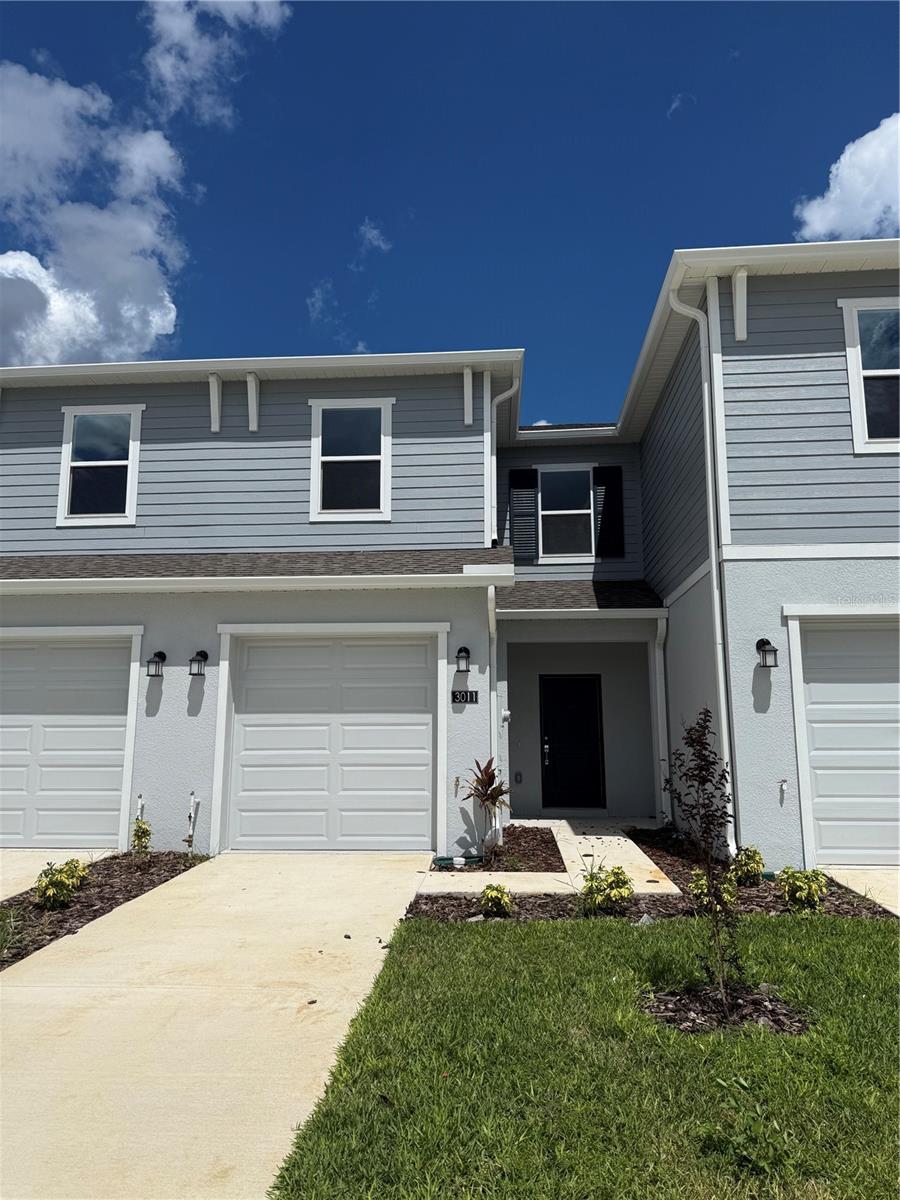 BRAND-NEW townhouse in Davenport! 3 bedrooms, 2.5 baths, 1-car garage. Modern open floor plan, stainless steel appliances, and walk-in closet in the master suite. Community pool and gym. Conveniently located near shopping, dining, and major highways. Move-in ready!