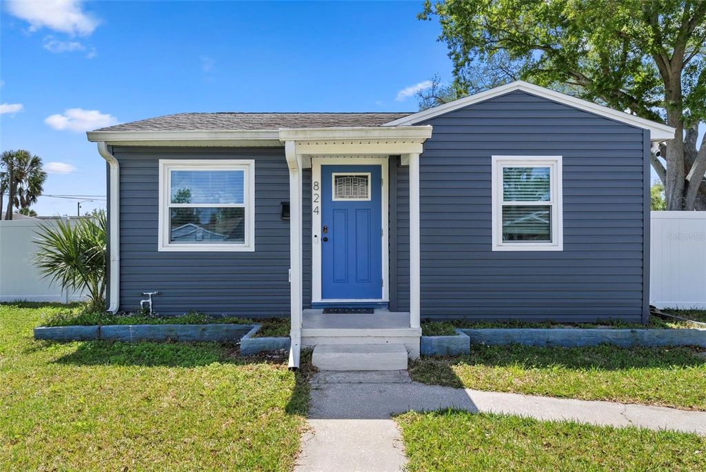 Photo of 824 61st Avenue NE, St Petersburg, FL 33703 (MLS # TB8494268)