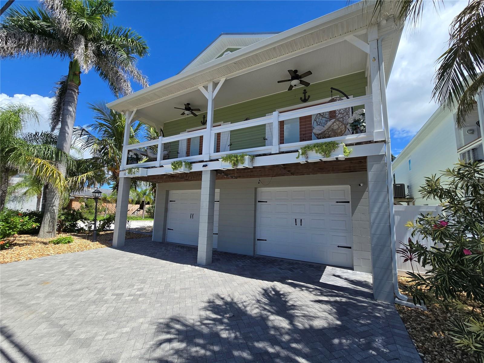 Furnished annual rental just blocks from Treasure Island Beach! Located on the Intracoastal in a protected lagoon, this coastal contemporary Key West-style home features sunrise and sunset views, wraparound porches, and modern updates.
Home Features:
3 bedrooms, 2 baths, open floor plan
Living room with built-ins, dining area, and chef\'s kitchen with island, breakfast bar, wine nook, pantry, white shaker cabinets & granite counters
Primary suite with French doors to porch, dual closets & updated bath with vanity + tiled steam shower
Guest bedroom with porch access + flexible 3rd bedroom/office
High-end finishes: eucalyptus floors, 9' ceilings, crown molding, designer fixtures
Oversized 4-car garage with storage for vehicles, golf carts, bikes, and fitness area
Outdoor Living:
Private oasis with tropical landscaping and floating dock
Covered lanai and Direct Gulf access
Launch kayaks/paddleboards from your backyard
Just two blocks to the beach (crosswalk at Gulf Blvd & 123rd Ave)
Grab your favorite agent for a showing today!