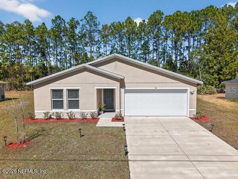 Photo of 91 Raemoor Drive, Palm Coast, FL 32164 (MLS # FC316881)