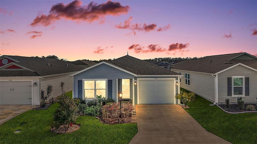 BEAUTIFULLY DESIGNED, TURNKEY 2-bedroom, 2-bath Haven patio villa boasting an INTERIOR LAUNDRY ROOM in the Kiersten Villas of the highly sought after CONTEMPORARY Village of Dabney! DABNEY POOL and RECREATION CENTER ACROSS THE STREET and JUST MINUTES to the NEW EASTPORT TOWN SQUARE! MOVE-IN READY and built in 2023, this nearly NEW home offers LOW-MAINTENANCE peace of mind with MODERN DESIGN! CURBED landscaping and a COVERED ENTRY VESTIBULE welcome you to this INCREDIBLE home! Step inside to discover a bright, OPEN-CONCEPT layout filled with NATURAL LIGHT, HIGH VAULTED ceilings, rich warm-toned LUXURY VINYL PLANK flooring, and stylish finishes throughout. The living, dining, and kitchen areas flow seamlessly, creating an inviting space for everyday living and entertaining. The AMAZING kitchen features crisp WHITE SHAKER cabinetry, NEUTRAL countertops, GAS cooking, STAINLESS steel appliances, convenient PULL-OUT storage, and a COUNTER-HEIGHT EAT-IN breakfast bar for casual meals, while an adjacent dining room provides additional space for hosting. The living room opens through sliding glass doors to the lanai, extending your living space outdoors. This wonderful area, is ideal for sipping your morning coffee or simply ENJOYING the gorgeous Florida weather! The primary suite offers a PEACEFUL RETREAT with two windows, a built-in closet, and an EN SUITE bathroom complete with a WALK-IN shower and WHITE SHAKER vanity. The SPLIT FLOOR PLAN places the second bedroom at the front of the home, featuring DOUBLE windows and a built-in closet - ideal for guests or a home office. A second bathroom includes a WHITE SHAKER vanity and a tub and shower combination. The centrally located INTERIOR LAUNDRY ROOM offers both functionality and convenience. Completing the package is an 13’x32’ one and a half car garage with PLENTY of space for a car and golf cart! DON’T MISS YOUR OPPORTUNITY TO MAKE THIS WONDERFUL HOME YOUR OWN! The Village of Dabney is IDEALLY LOCATED between the new  Eastport Town Center with shopping, dining, and live nightly entertainment and the ever popular Sawgrass Grove! Close to Dabney, Franklin, Saluki, and Olympia Recreation Centers (4.8mi); Shallow Creek Championship Golf Course (7.3mi); Farragut Softball Complex (4.9mi); Boosters Bar and Grill (7.3mi); Sophie Doodles Canine Park (4.8mi); Publix (2.9mi); Aldi (2.9mi); Walgreens (2.9mi); Oakwood Smoke House (3.3mi); Beef O'Brady's (2.9mi); Miles of walking/biking pathways (no golf carts) along a nature preserve at Sawgrass Grove (5.3mi) and much more! PLEASE WATCH OUR VIDEO of this FANTASTIC TURNKEY HOME and CALL TODAY to schedule your private showing or virtual tour!