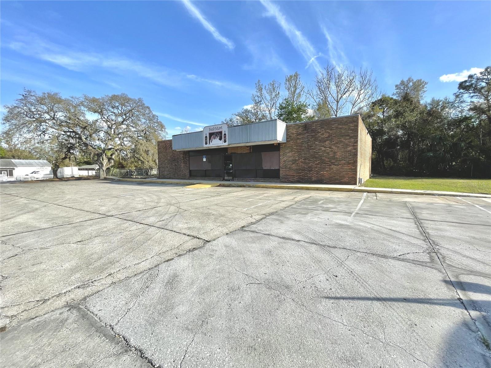 Buyer Opportunity !!! Only minutes to The Villages this 2,501+/- SF Building is on a .92+/- Acre corner at South St and Holiday Lane. Building has previously been a retail store but can easily be offices. Property has plenty of paved parking with space left over. Location has excellent visibility with easy access and FDOT 17,300 Avg trips per day. Site is about an hour to Orlando or Ocala and minutes to US Hwy 441, 27 or 301 and a short drive to Florida's Turnpike & I-75. All information is believed accurate and correct but not guaranteed or warranted and subject to change without notice.