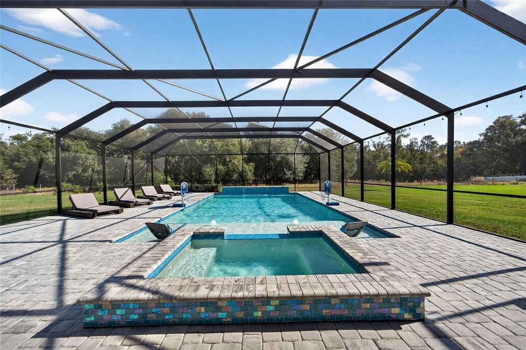 Photo of 10579 Meadowrun Drive, Lithia, FL 33547 (MLS # TB8454267)