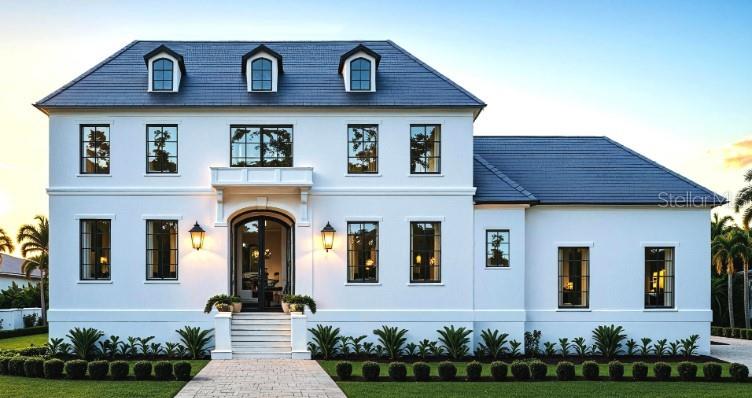 Pre-Construction. To be built. Introducing a one-of-a-kind pre-construction opportunity on Davis Islands. Designed and built by Bayfair Homes, this luxury estate will offer over 6,100 square feet of air-conditioned living
space with five bedrooms, four full baths, two half baths, a study, and a spacious bonus room. The thoughtfully designed floor plan includes a downstairs primary suite with dual walk-in
closets, a dramatic grand staircase, and a gourmet kitchen complete with a scullery kitchen, quartz countertops, and a premium Thermador™ appliance package. Elegant details such as
coffered ceilings, engineered hardwood floors, and a luxury trim package create a timeless yet modern aesthetic. Situated on an expansive 13,500+ square foot corner homesite, the residence
also includes an oversized three-car garage with room for future vehicle lifts, an optional elevator, and covered outdoor living spaces pre-plumbed for a summer kitchen. The property will be
delivered with a luxurious pool and spa package, professionally designed landscaping, and designer-selected finishes throughout. Built to the highest standards, the home features
impact-rated casement windows, spray foam insulation, concrete block foundation walls, and FEMA-compliant elevation for lasting quality and peace of mind. Just minutes from Downtown
Tampa, Davis Islands offers the perfect blend of exclusivity and convenience, with top-rated schools, marinas, parks, and vibrant village dining and shopping nearby. This is a rare opportunity
to secure a true luxury custom home in one of Tampa Bay’s most desirable neighborhoods. Please Note: The land must be purchased separately from the build. House images are virtual
renderings intended to illustrate the possibilities of your future home. Buy only the lot and build your own home.