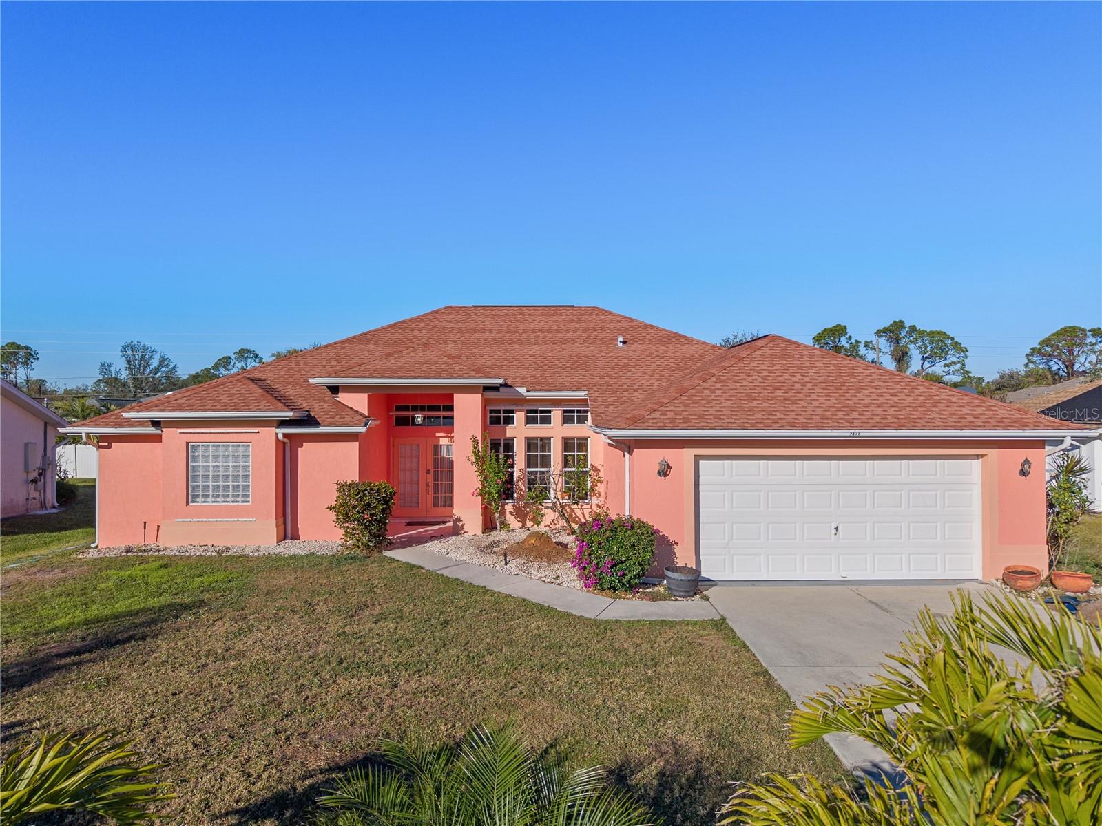 Location Location Location - This 2000 Sq Ft home that has had many upgrades is a MUST SEE!. Spacious Living that extends beyond the great room, Kitchen and Bedrooms. The outdoors are truly an extension of the home and create the proverbial Florida Living Lifestyle. Privacy, Peace and Tranquility! While feeling a world away, pleasantly surprising you are in close proximity to local beaches, shopping , healthcare, restaurants and Sporting activities for not only great viewing but participants as well. A great floorplan with cathedral ceilings offeringa harmonious blend of modern and traditional living space.