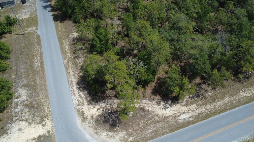 Photo of SW Rainbow Lakes Boulevard, Dunnellon, FL 34431 (MLS # G5112018)