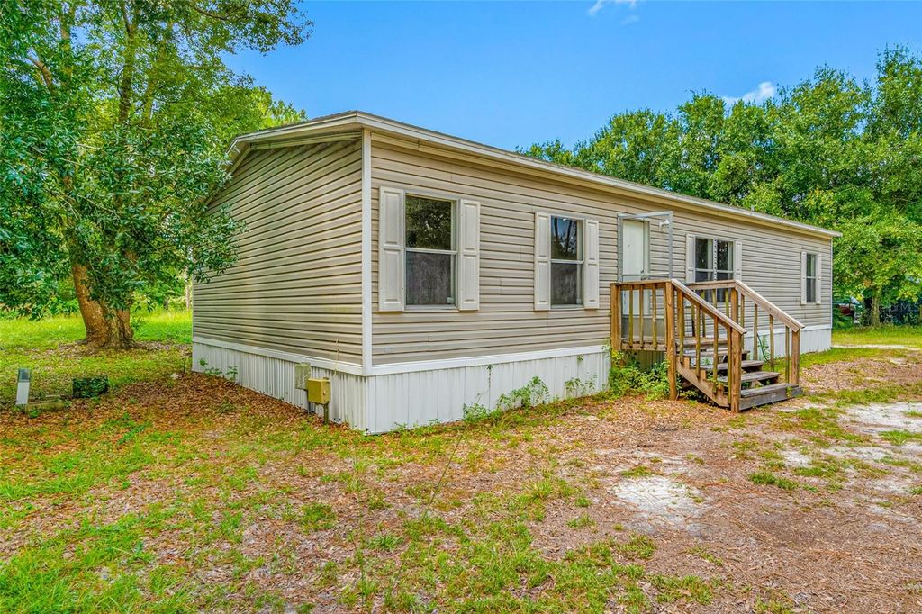 Photo of 17650 Driftwood Lane, Lutz, FL 33558 (MLS # TB8417967)