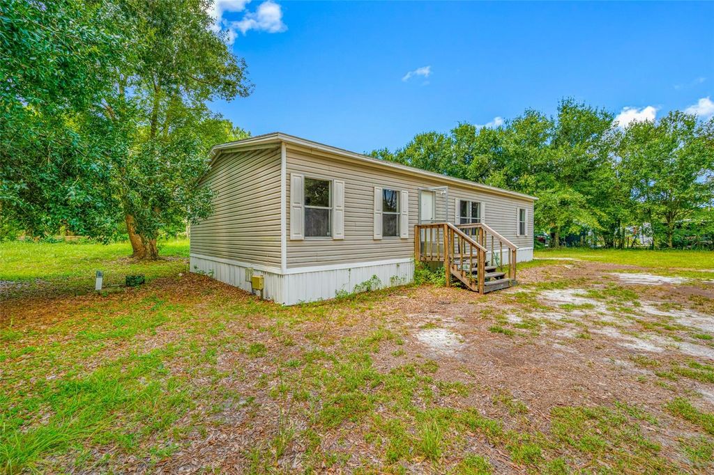 Photo of 17650 Driftwood Lane, Lutz, FL 33558 (MLS # TB8417967)
