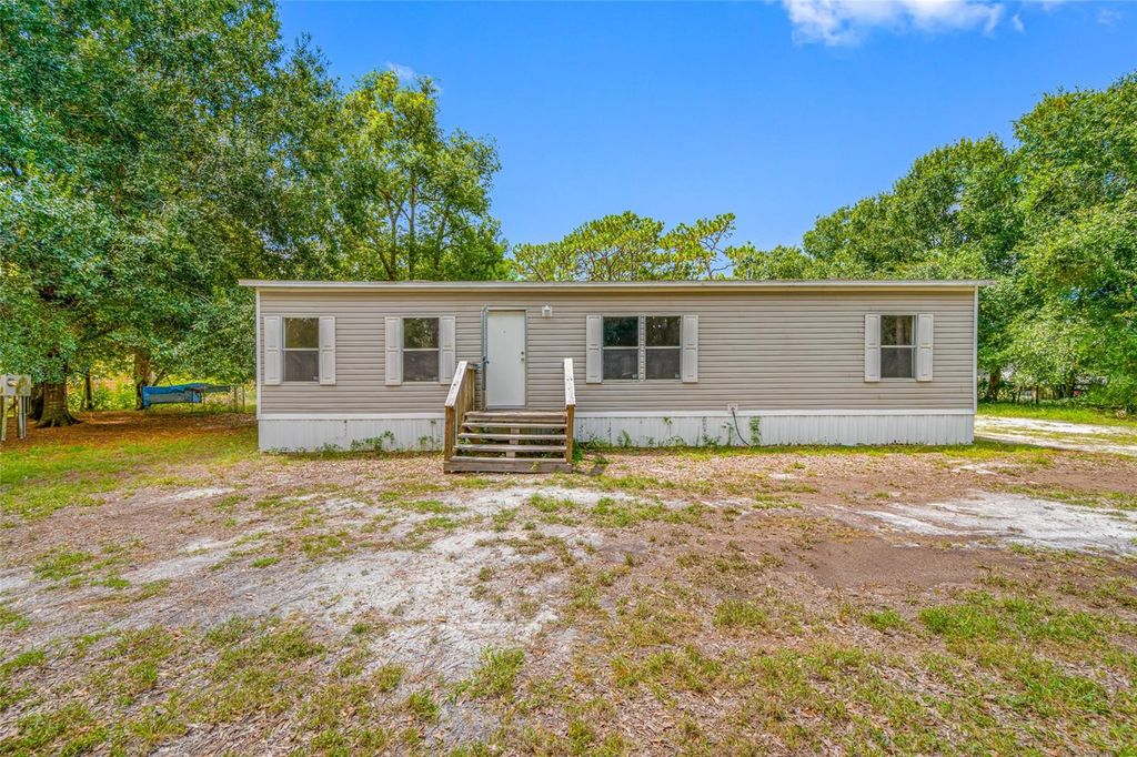 Photo of 17650 Driftwood Lane, Lutz, FL 33558 (MLS # TB8417967)