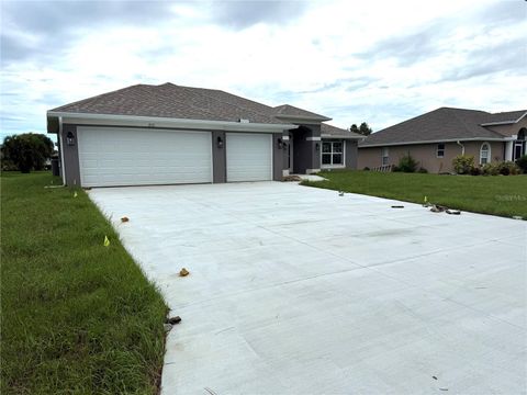 Photo of 277 Long Meadow Lane, Rotonda West, FL 33947 (MLS # C7508726)