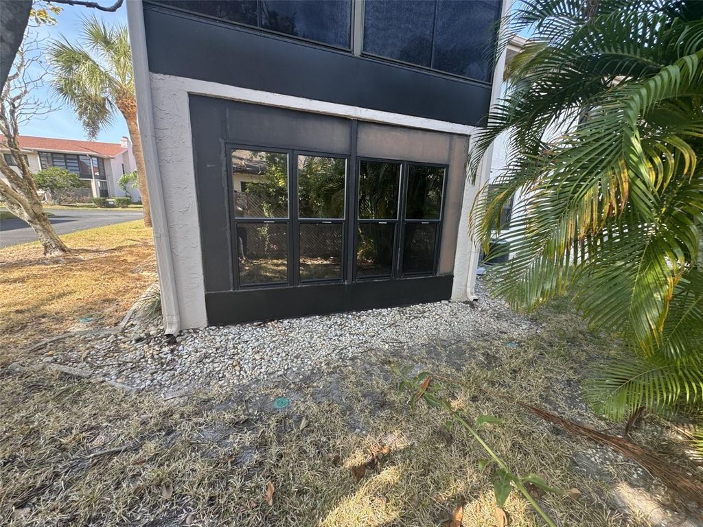 Photo of 9920 Eagles Point Circle #2, Port Richey, FL 34668 (MLS # O6366549)