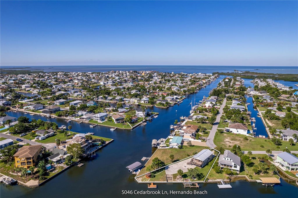 Photo of 5046 Cedarbrook Lane, Hernando Beach, FL 34607 (MLS # W7889886)