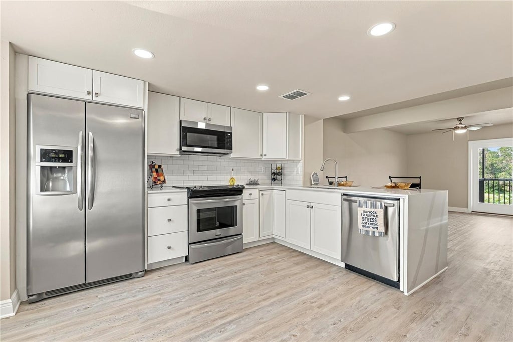 Photo of 1202 Brigadoon Drive, Clearwater, FL 33759 (MLS # TB8549419)
