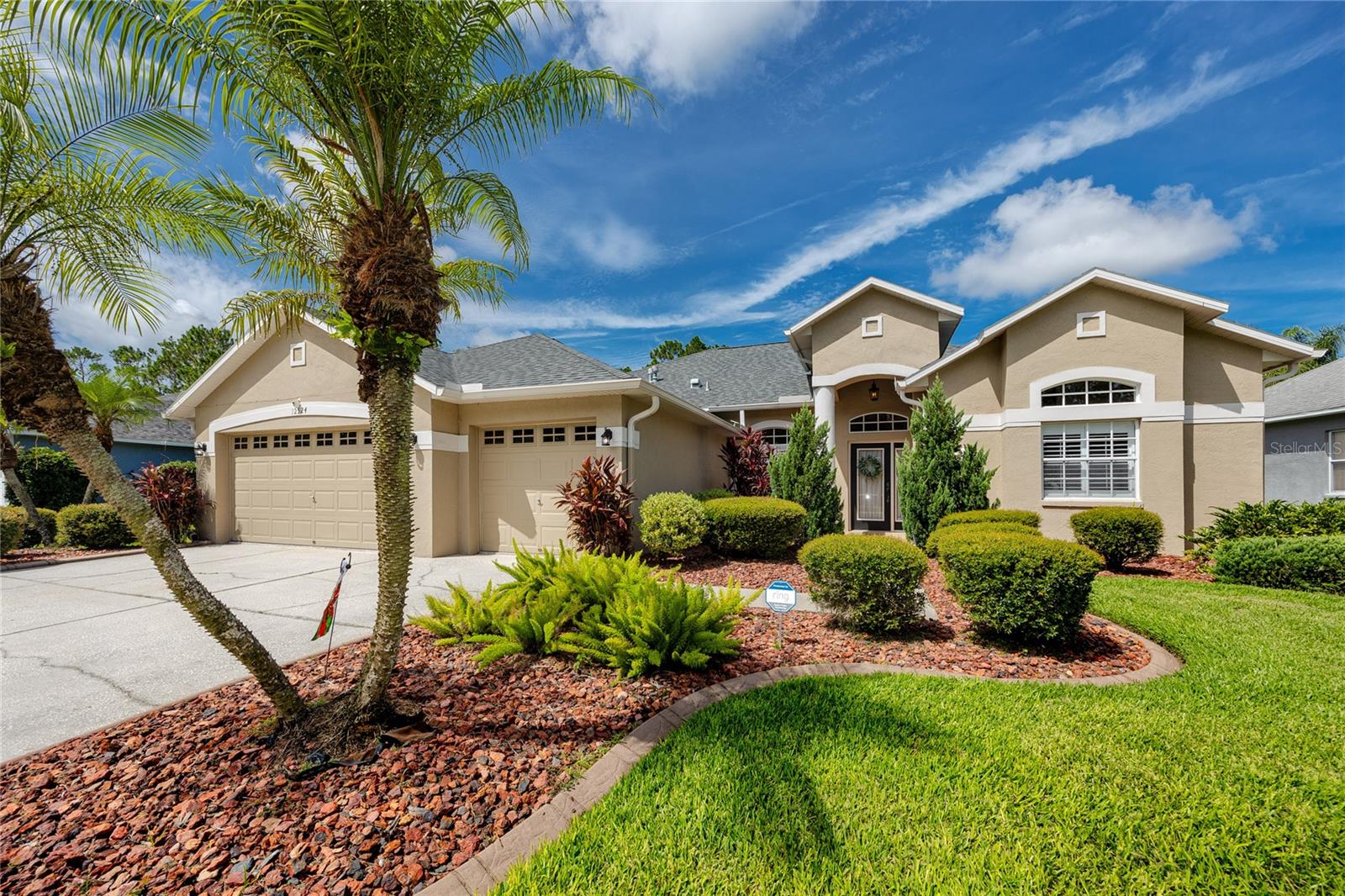 Stunning Westwood Lakes POOL HOME with 4 beds, 3 baths, an oversized 3-car garage, and an incredible outdoor oasis—perfect for entertaining and relaxing in style. From the moment you arrive, you’ll be impressed by the tropical landscaping, great curb appeal, and meticulous care throughout.
Inside, enjoy a wide-open, split-bedroom floor plan loaded with upgrades: soaring ceilings, tile and laminate wood floors, fresh interior finishes, and abundant natural light. The chef’s kitchen is a showstopper, featuring exotic granite countertops, 42” solid wood cabinetry, a granite backsplash, natural gas range, black stainless Frigidaire French door fridge, KitchenAid dishwasher, and an oversized breakfast bar.
The spacious family room includes a 75" 4K LG TV with Samsung soundbar and flows beautifully to the resort-style screened-in pool with jacuzzi jets, an electric pool heater, lush palms, a covered lanai with outdoor lighting, and a 70" 4K LG TV for watching the game or your favorite movies al fresco.
Retreat to the private primary suite with pool access, two large walk-in closets, dual granite vanities, a garden tub, and a gorgeous frameless walk-in shower. Plantation shutters throughout most of the home, newer carpet in the secondary bedrooms, and upgraded LG washer/dryer (2020) are all included.
Other highlights include: a NEW ROOF INSTALLED in 2020, Frigidaire garage fridge (2020), water softener (2020), Ring camera system, fresh exterior paint, and a professionally landscaped yard. Seller is offering a one-year HOME WARRANTY as an added benefit to the buyer.
All of this in a highly desirable community with A+ schools, scenic parks, LOW HOA, and NO CDD—just minutes from shopping, dining, Tampa International Airport, and world-famous beaches.
This one checks all the boxes—schedule your private showing today before it’s gone! Check the property video: https://youtu.be/fvLP6bLIjgM