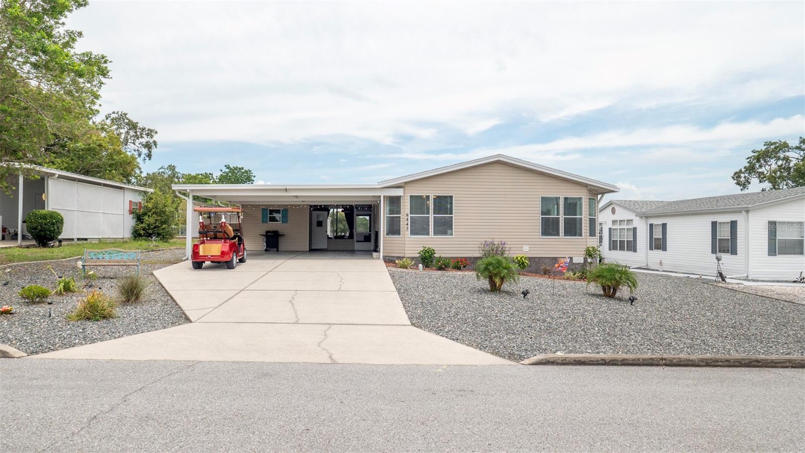 Welcome to your dream retirement home in the beautiful 55+ community of Brooksville, FL! This charming manufactured home boasts 3 bedrooms and 2 bathrooms, perfect for hosting family and friends. With 1,604 square feet of living space, there is plenty of room to relax and enjoy the Florida sunshine.
This home has been thoughtfully updated for your comfort and peace of mind, featuring a new asphalt roof installed in September 2023, brand-new flooring throughout, and a fresh coat of paint across the entire home. The AC unit (2021) is in excellent condition, with a brand-new motor installed in October 2024, ensuring year-round comfort.
The home comes fully furnished, making it move-in ready and hassle-free. The open floor plan allows for easy entertaining, and the large windows provide ample natural light. Enjoy your morning coffee on the spacious front porch or take a stroll through the peaceful neighborhood.
Located in a quiet and friendly community, you'll have access to all the amenities you could want, including a clubhouse, fitness center, and social activities. Don’t miss out on the opportunity to make this your forever home. Schedule a showing today!