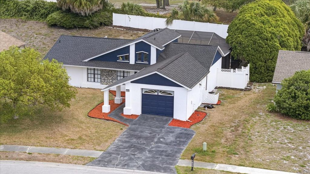 Photo of 7834 Seasons Lane, New Port Richey, FL 34653 (MLS # TB8503693)