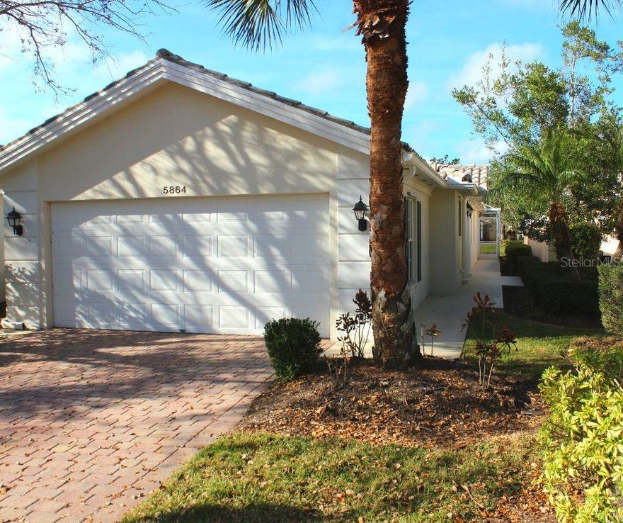 Yes, this 1693 sq ft waterfront villa certainly lives up to its promise of an unparalleled lifestyle! With two bedrooms, two full baths, a spacious screened lanai and two car garage, this property offers all the amenities expected from a premium home. Residents of the VillageWalk community will be living in a beautifully manicured landscape with ponds, bridges, walkways and lush foliage; the perfect backdrop for your outdoor activities. The community also has its own café and gas station, making it very convenient for residents. Not to mention, the excellent dining, shopping and world renowned Siesta Key beach are only a short drive away - what more could one ask for?