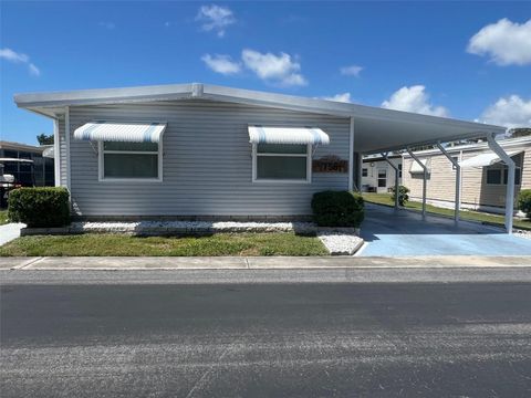 Photo of 758 Royal Palm Circle, Largo, FL 33778 (MLS # TB8388818)