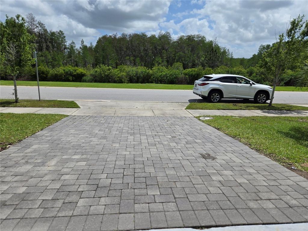 Photo of 4543 Storytelling Way, Kissimmee, FL 34746 (MLS # O6395673)