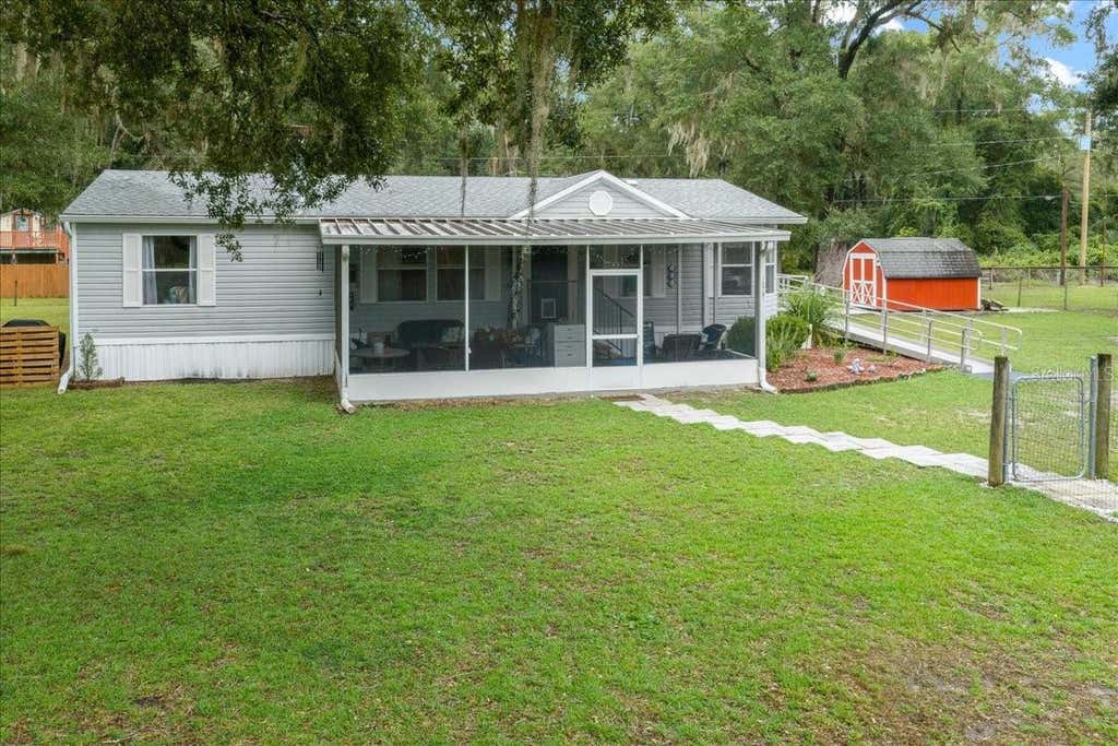 Photo of 15701 NE 150th Avenue, Fort Mccoy, FL 32134 (MLS # OM729860)