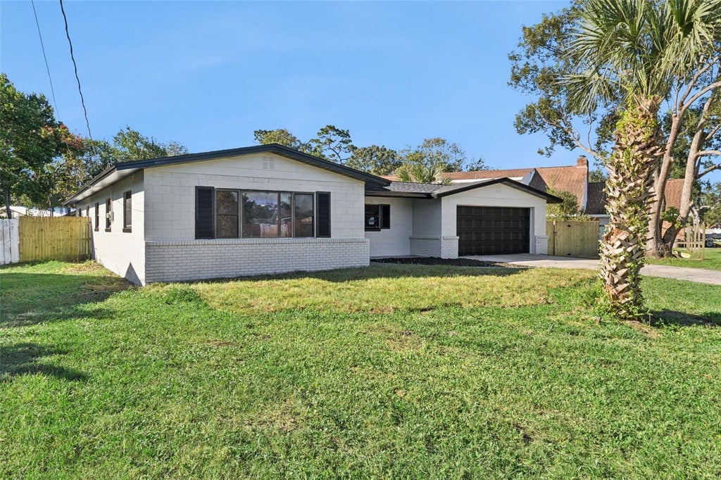 Photo of 720 Highland Terrace, Titusville, FL 32796 (MLS # O6450435)