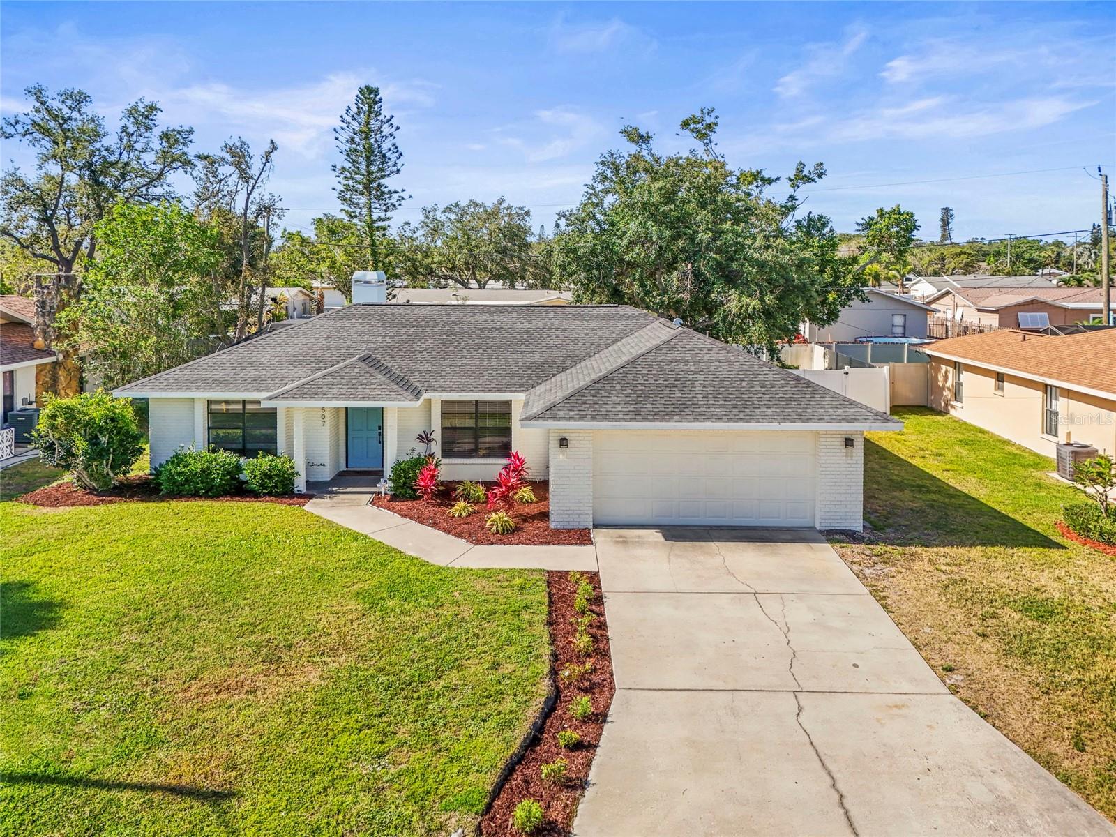 Welcome to 7507 3rd Ave NW, a beautiful 3-bedroom, 2-bathroom home in the desirable Indian Springs neighborhood of Northwest Bradenton! This 1,665-square-foot home, features a newer roof (2023) and updated renovations throughout. The home offers a perfect combination of charm and modern convenience. Step inside to find vaulted ceilings in the living room, a cozy wood-burning fireplace, and a spacious den that can be used as an office or additional living space. The inviting kitchen features solid wood cabinetry, soft-close drawers, new quartz countertops, newer appliances (2024) and a bright dining room overlooking the sparkling pool. The generously sized master suite provides comfort and privacy with a walk in closet and renovated ensuite bathroom. The outdoor space is designed for relaxation and entertainment. It features a pool and spa, with newer pool equipment (2023), surrounded by a paver patio within a pool cage. Also, a peaceful fully fenced in backyard is beautifully landscaped, ready to be enjoyed. Located just minutes from the pristine beaches of Anna Maria Island and within a top-rated school district, this home is an excellent choice for families or anyone looking to enjoy the best of Florida living. Don’t miss this opportunity to make it yours!