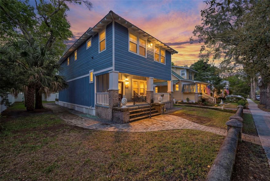 Turnkey, income-producing, and perfectly positioned—this fully renovated historic home in St. Augustine’s Uptown District is a proven short-term rental just steps from St. George Street and minutes to Vilano Beach. Sold fully furnished and ready to go, this is a rare opportunity to step into immediate rental income in one of the most desirable areas of St. Augustine.
A spacious front porch with a warm wood-paneled ceiling sets the tone, offering the perfect place to relax, unwind, and take in the charm of this historic neighborhood.
Originally built in the early 1900s, this charming home was taken down to the studs and completely renovated in 2020, blending preserved historic character with modern luxury and efficiency.
At the heart of the home is a beautifully designed chef’s kitchen, featuring granite countertops, expansive prep space, and generous seating for dining and entertaining.

A built-in wine refrigerator adds a layer of luxury, while the adjoining mudroom leads directly to the back porch, creating an effortless indoor-outdoor flow.
The home offers two primary suites, each thoughtfully designed for comfort and privacy. The first-floor primary suite provides convenient single-level living and features a luxurious walk-in shower. Upstairs, the second primary suite includes a spa-like walk-in shower and access to a large sunroom—perfect for reading, relaxing, or enjoying quiet mornings.

In addition to the upstairs primary suite, the second floor features two additional guest bedrooms, a large spa-like guest bathroom, and a dedicated laundry room, making the layout ideal for hosting guests or maximizing rental flexibility.

Modern upgrades include a metal roof, foam-insulated exterior walls, floors, and ceilings, an on-demand hot water heater, and a whole-home water treatment system.

Outside, the property continues to impress with new vinyl fencing for privacy, a spacious backyard with room to expand, and ample off-street parking located outside the fenced area. The oversized lot offers future potential for a pool, detached garage, or accessory dwelling unit or in-law suite (buyer to verify development potential).