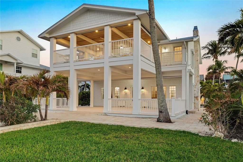 Photo of 8241 Main Street, Bokeelia, FL 33922 (MLS # C7522372)