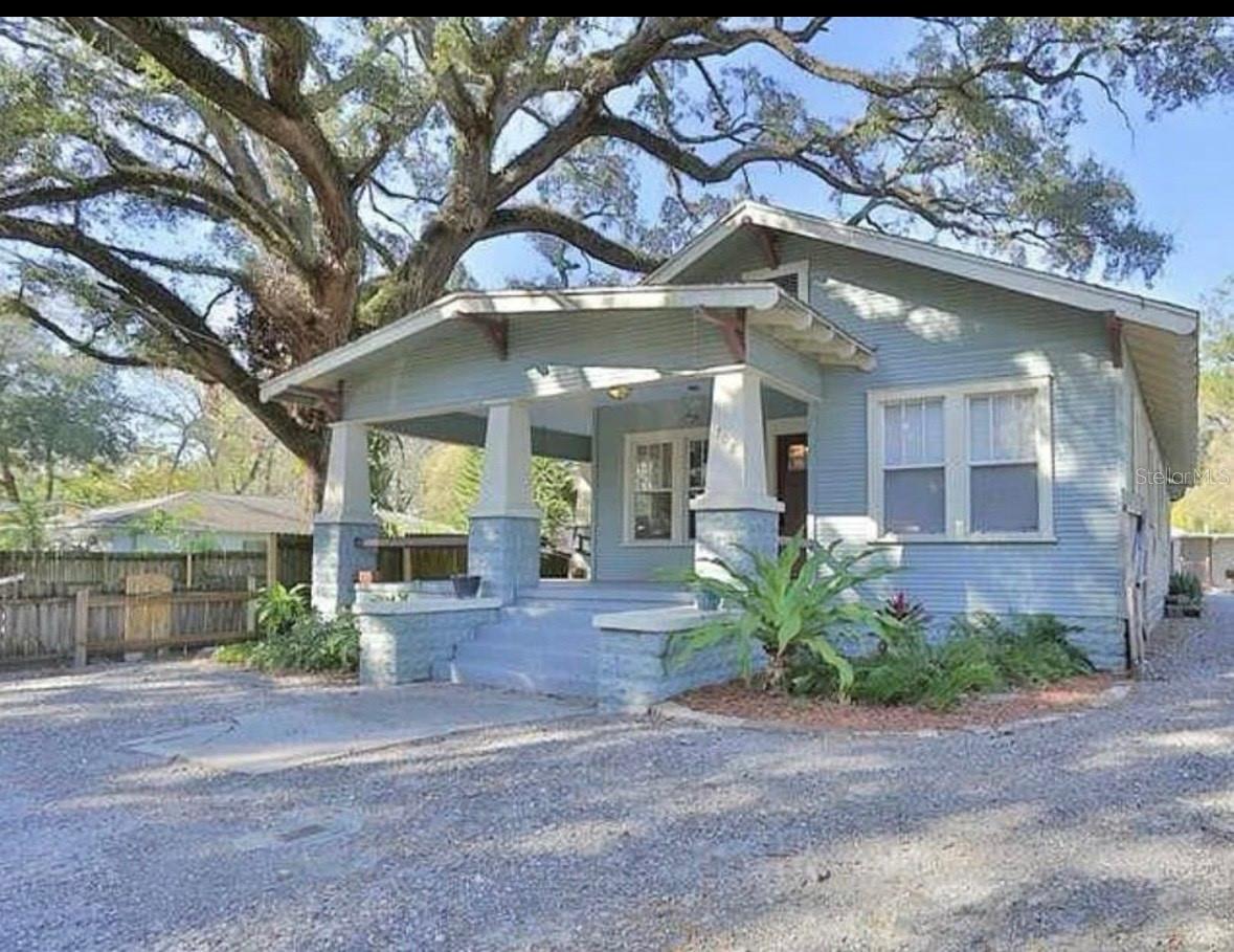 This incredible property includes **two homes**, offering endless possibilities! Fully fenced with separate parking for each house, it provides privacy and convenience. The **main house** features 3 bedrooms and 2 baths, boasting modern flooring, crown molding, a beautiful stone fireplace, updated light fixtures, and stylish gray paint tones. The spacious kitchen offers extensive stone tile countertops, ample cabinetry, all appliances, and a breakfast bar, with a dedicated laundry room—including a washer and dryer—just off the kitchen. The primary suite includes a walk-in closet and an ensuite bathroom with a stunning stand-up shower, while the generously sized secondary bedrooms share an upgraded bathroom. The back house** is a 2-bedroom, 1-bath gem, updated with laminate flooring, crown molding, newer kitchen cabinetry, and its own separate laundry area in the shed. Whether you're searching for a **multi-generational living space** or an **income-producing investment**, this property is a fantastic opportunity. **Call today to schedule a showing!**