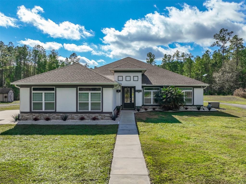 Photo of 4895 W Highway 100, Bunnell, FL 32110 (MLS # FC315410)