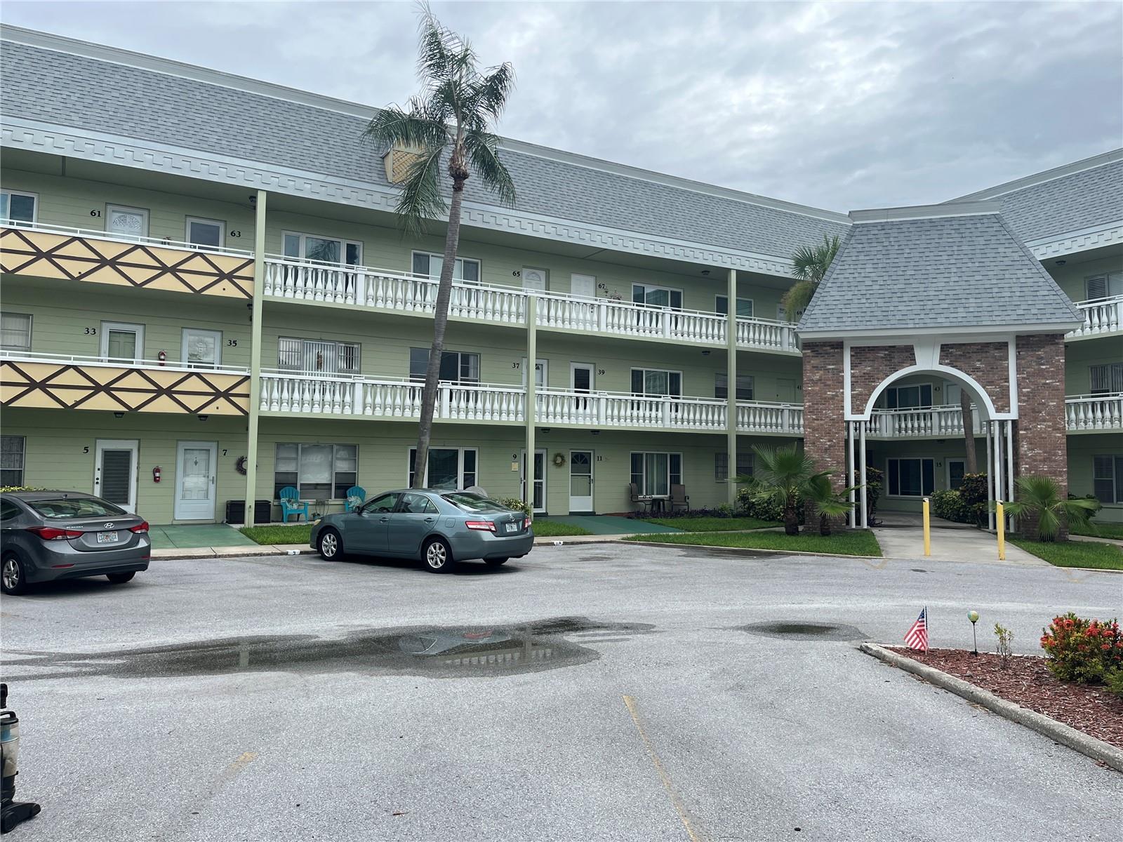 This Condo is conveniently located at the end of a quiet Cul De Sac and also located within walking distance of the main OTOW Clubhouse. Come and put your own person touches on this home and enjoy the convenience of the Laundry Facilities located just outside on the same floor. Assigned parking. The 55+ community has two activity centers, and two private golf courses with 9 and 18 holes, free exclusively for resident owners. There are two heated swimming pools. The remodeled Cardio Gym has the latest exercise equipment. A very pet-friendly community, there is a fenced dog park with covered seating. There are hobby studios, and a wood shop for the exclusive use of the residents. Activities include fitness classes, dancing, clubs, cards, billiards, entertainment, classes, and much more. The on-site Good Karma Café has take & bake meals and snacks. Close to beaches, transportation, shopping, entertainment, and fine dining. All room sizes, floor plans and square footage are approximate. This property is being transferred by a leasehold estate deed. Association approval is required. If financing, a 35% down payment is required.