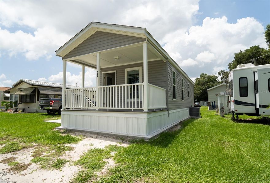 MOVE IN SPECIAL AND WAIVED APPLICATION FEE. 55+ COMMUNITY. Welcome to the pinnacle of senior living in Zephyrhills, FL! Embrace the opportunity to be the very first to reside in this immaculate 2023 Champion Park Model homes, nestled within the secure and inviting community of The Village of Zephyrhills. Perfectly tailored for seniors seeking the relaxed Florida lifestyle, these one-bedroom, one-bathroom gems offer a pristine haven. With rent starting at just $1150 per month and the convenience of housing vouchers being accepted, now is the time to make this vibrant community your home.
Key Features:
1) A spacious 469 sq. ft. open layout that maximizes living space.
2) A 104 sq. ft. covered front porch for enjoying the Florida sunshine.
3) A generously sized bedroom with ample closet space.
4) A well-appointed full bathroom with a shower, generous counter space, and built-in storage solutions.
5) A kitchen equipped with essential appliances, including a built-in microwave, dishwasher, electric range, and a refrigerator.
6) Central air conditioning ensures your year-round comfort.
7) Wood-style vinyl flooring and crown molding throughout for a touch of elegance.
8) We are a pet-friendly community, welcoming your furry companions.
9) At The Village of Zephyrhills, our 55+ residents enjoy an array of amenities designed to enhance your quality of life. Take a refreshing dip in the pool, gather with friends in the air-conditioned clubhouse and game room, take care of your laundry needs with ease in our convenient facilities, and stay connected with complimentary Wi-Fi access.
Lease Terms:
1) Application fee has been waived
2) First, Last Month's Rent as well as Security Deposit are required.
3) A Nonrefundable Pet Fee of $250 is applicable for pets under 35 pounds.
If you're considering a more permanent residence, purchase options are also available.
Seize this fantastic opportunity to embrace a vibrant and enriching community where you can truly enjoy your golden years. Don't hesitate – call us today to schedule a personalized tour of your potential new home!