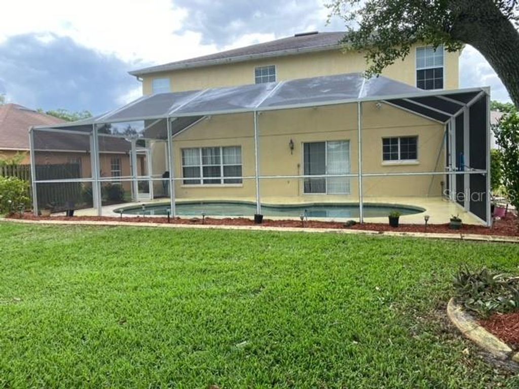 Photo of 7411 Hunters Greene Circle, Lakeland, FL 33810 (MLS # L4959849)