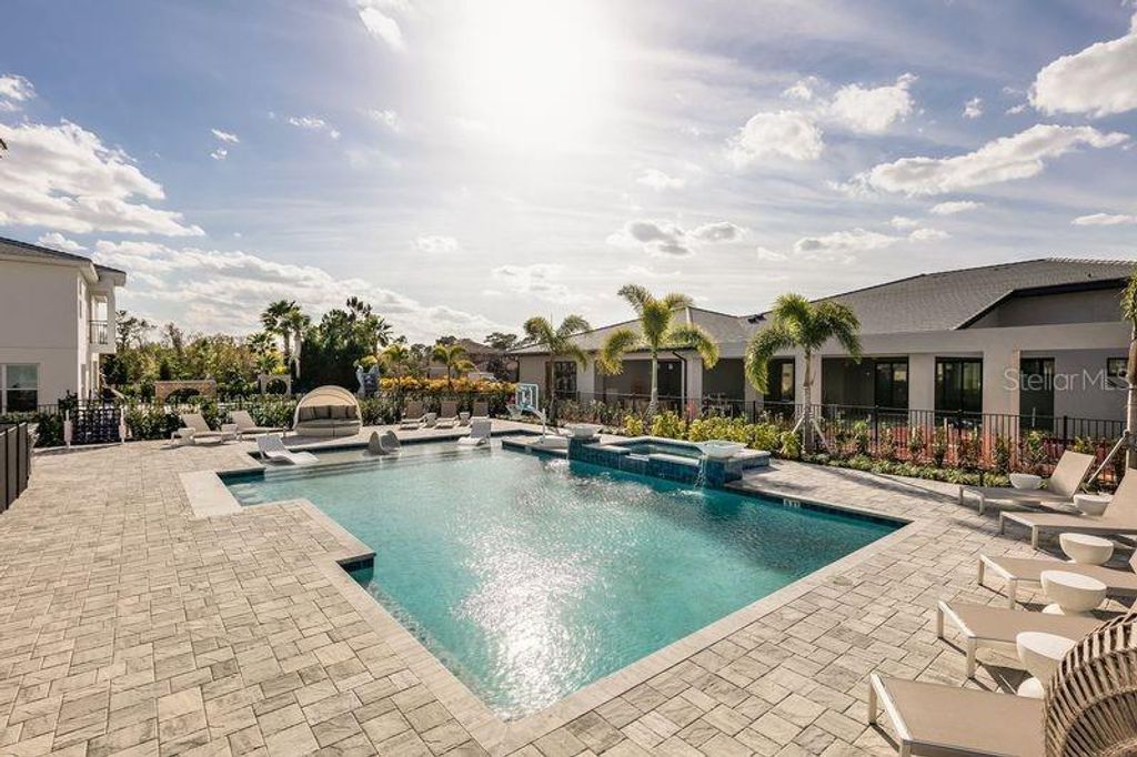 Photo of 1008 Coyote Creek Way, Reunion, FL 34747 (MLS # O6394529)