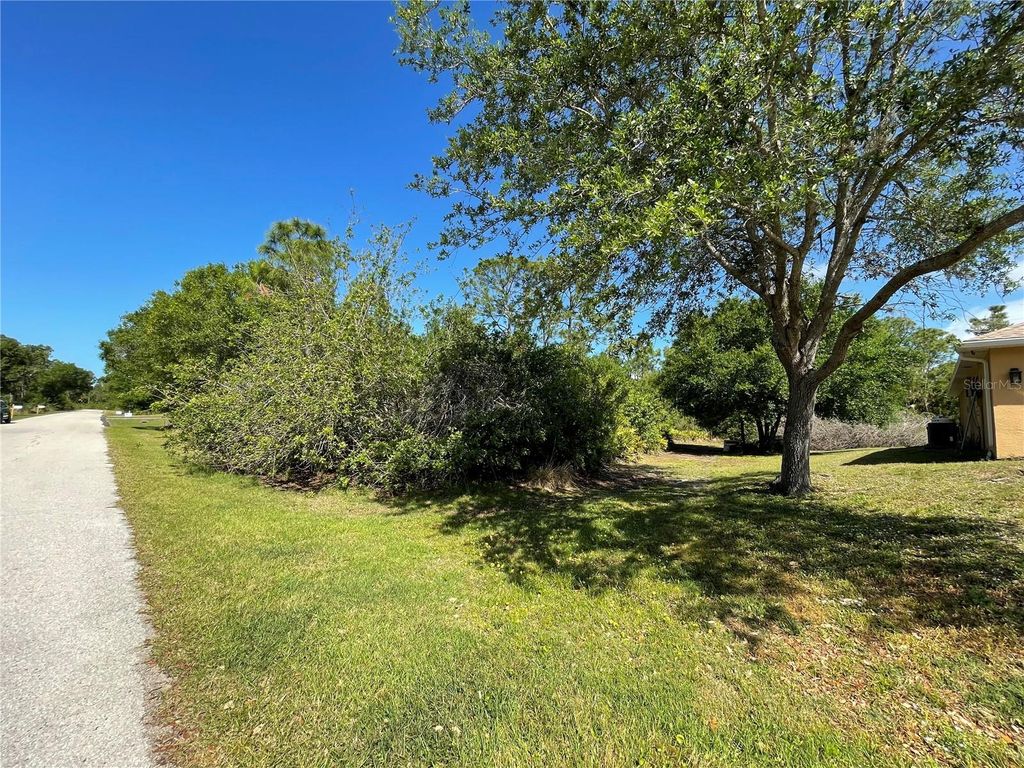 Photo of 23430 Racine Ave, Port Charlotte, FL 33980 (MLS # C7507821)