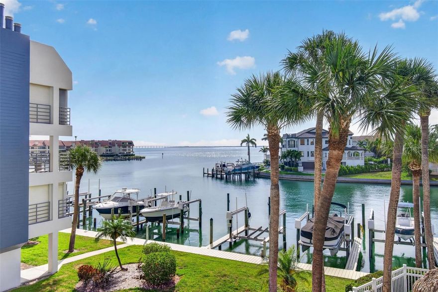 Dive into the ultimate waterfront lifestyle with this stunning 2-bedroom, 2-bathroom condo at 363 Pinellas Bayway, Unit 42, nestled in the highly coveted Tierra Verde community. Surrounded by multi-million dollar homes, this gem offers a rare blend of luxury, comfort, and functionality.

Step inside to an inviting and open living space that boasts a cozy fireplace – perfect for unwinding on cooler evenings. The kitchen and living areas flow seamlessly, making it ideal for entertaining or simply soaking in the serene water views. Modern conveniences like an indoor washer and dryer add a touch of practicality to the effortless elegance of this home.

But the true highlight? Your private slice of paradise right outside. This unit comes with a 10,000 lb boat lift and slip, making it a dream come true for boating enthusiasts. Whether you're heading out for a day on the Gulf or enjoying a peaceful sunset cruise, the water is your playground.

Situated in the heart of Tierra Verde, you'll find yourself surrounded by the beauty of coastal living and the prestige of a sought-after community. Don't miss your chance to claim this waterfront retreat and live the Florida lifestyle you've been dreaming of!