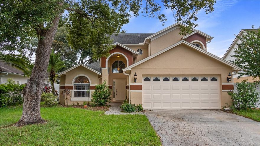 Come one and and all to this fantastic home.  The first thing you will notice is the fresh exterior paint. New paint really POPS.  You don't have to worry about your guests getting wet with the spacious front entry.  This home is just over 1800 sq ft, it has 4 bedrooms and 2.5 bathroom. The master bedroom is located downstairs!  As you enter the home the foyer gives you lots of options.  You can head to the garage, kitchen, living area, upstairs, or the half bath.  If you take a left from the foyer you enter the kitchen which has a new facelift with white shaker cabinet faces, stainless steel appliances, marble counter tops, tile backsplash and ceramic tile.  The kitchen has an eat-in breakfast space will large windows as well and being open to the dinning and living rooms.  You won't miss out on any of the action as you check on the meal or finish up a few dishes.  The living and dining room combo adds to the openness of the space which is amplified by the soaring ceilings and brick fireplace.  Rounding out the ground floor is the master suite.  The ensuite bath is very large.  It has a separate garden tub and stand up shower enclosure. If you have a hard time sharing bathroom space there is no need to worry, the double vanity is enormous and even has a place to sit to put on your final beautifying touches before you head out. The "thrown" is also behind closed doors. You can also access the large closet in the bath. (don't forget there is "secret bonus storage" around the corner in the closet)
Head back through the living room to the foyer and head upstairs.  The fourth bedroom has an amazing wood arched door that really brings a higher level of class to the space.  All the three upstairs bedrooms features built in closets and are ample in size. The secondary bath has a nice window bringing natural light into the space while still providing privacy.  The back yard is made for grilling and low maintenance with a large patio and planters with palm trees.  The yard won't take much to maintain.  The community is super close to the local public schools and you have options on how to get to Lake Mary Blvd with its shopping and dinning experiences.  Come on over today and take a look.  We look forward to hearing from you.  Private tours available.